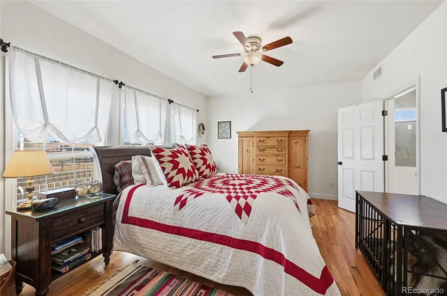 a bed room with a bed and a tv