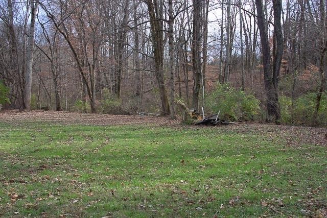 a house with swimming pool in front of it