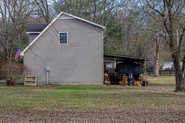 a view of a street sign of the house front of the house