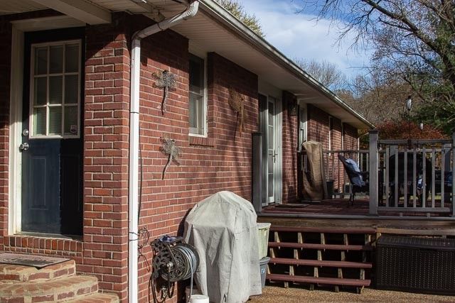 a couple of chairs sitting in front of a building