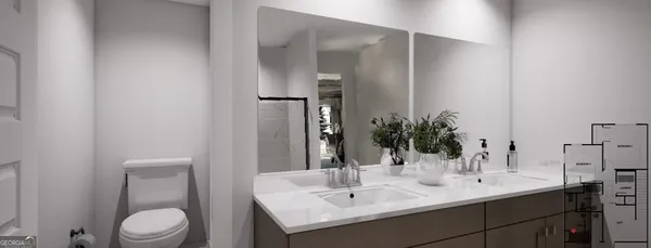 a bathroom with a sink and a mirror with toilet