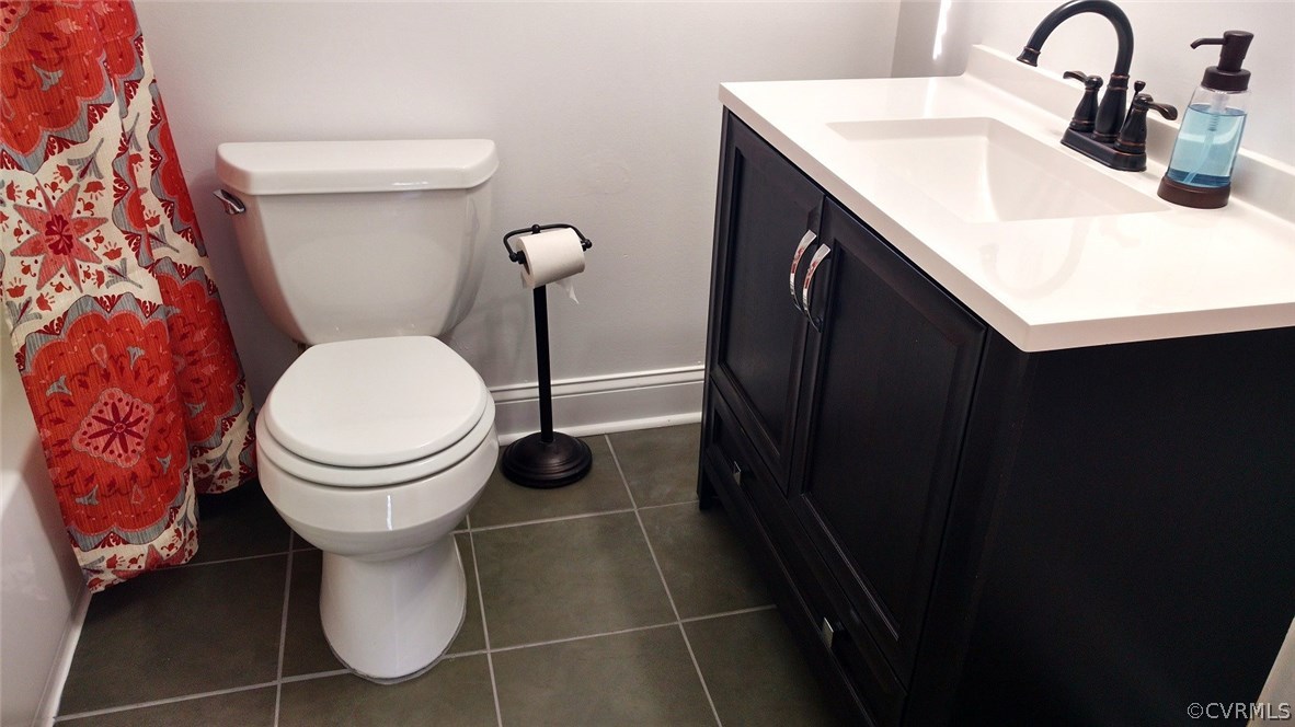3904 Echo Ridge Place Midlothian, VA 23112 - Photo 11 of 26 a bathroom with a sink and a toilet