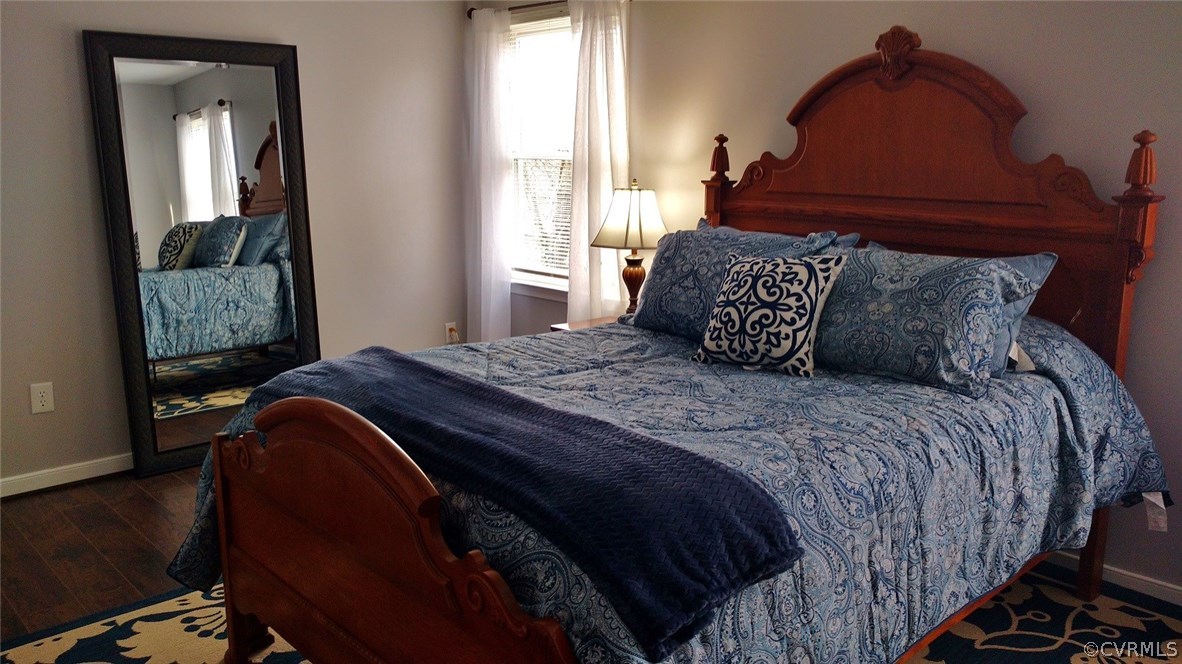3904 Echo Ridge Place Midlothian, VA 23112 - Photo 9 of 26 a bedroom with a bed and window