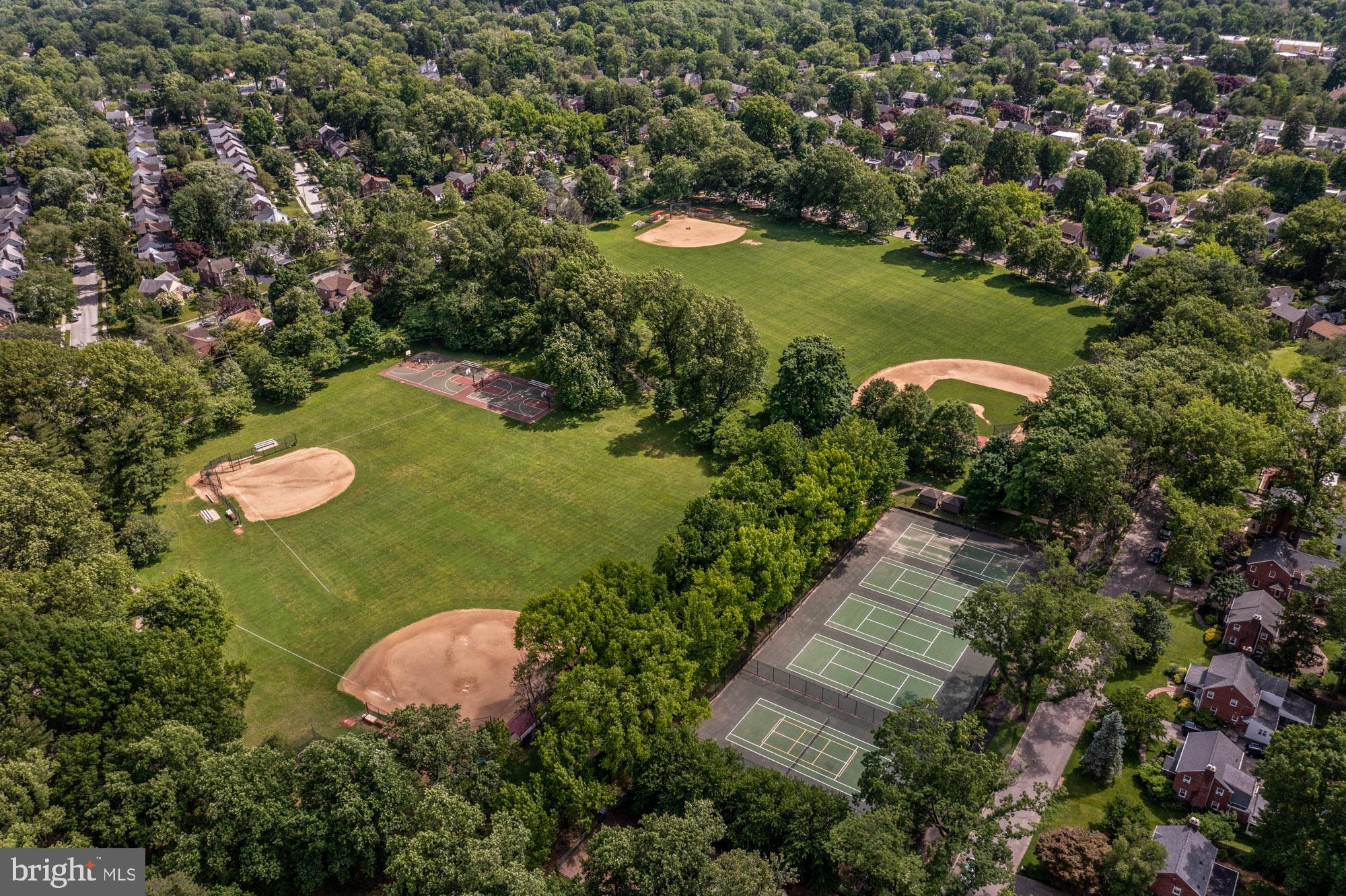 383 Lakeside Road, Unit G2 Ardmore, PA 19003 - Photo 15 of 16 a view of a lake with a yard