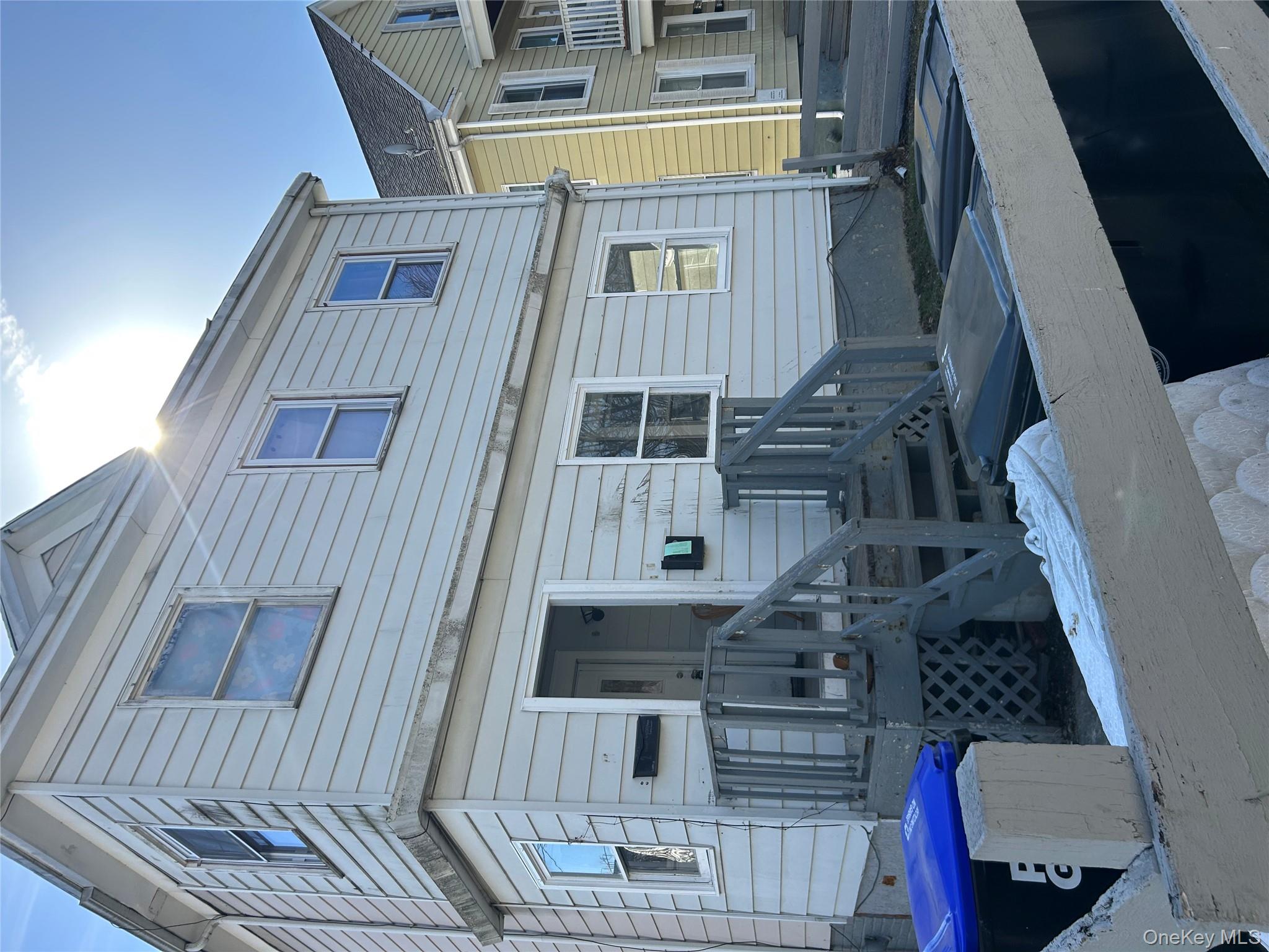 1 Gray Street Poughkeepsie, NY 12603 - Photo 4 of 22 a front view of house with street