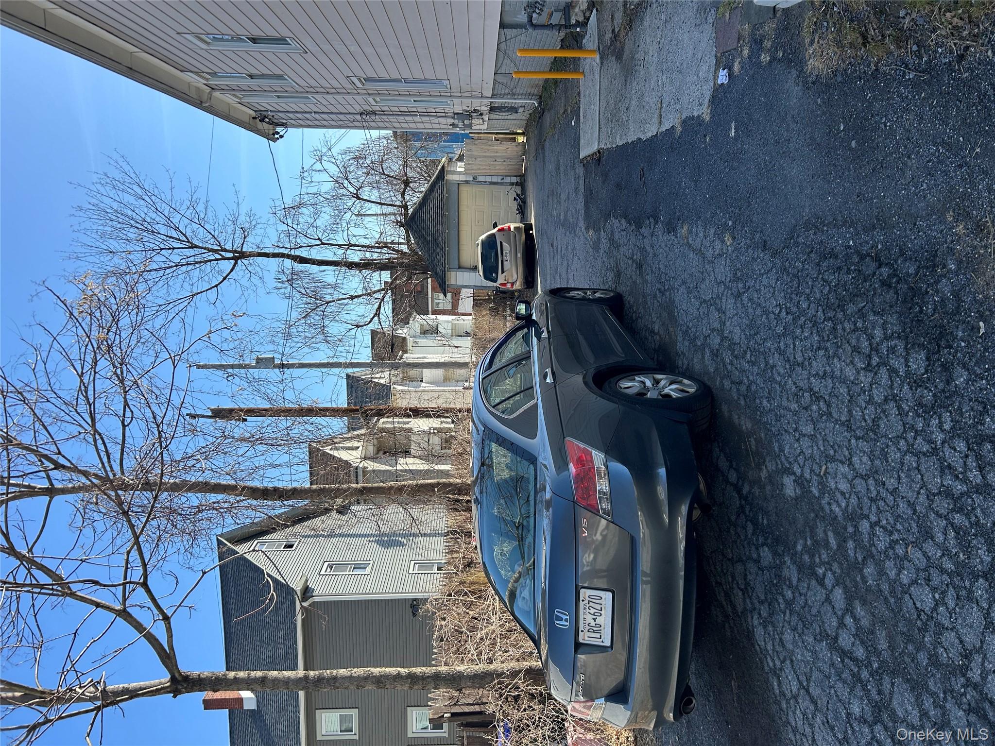 1 Gray Street Poughkeepsie, NY 12603 - Photo 5 of 22 a view of car parked in front of a house