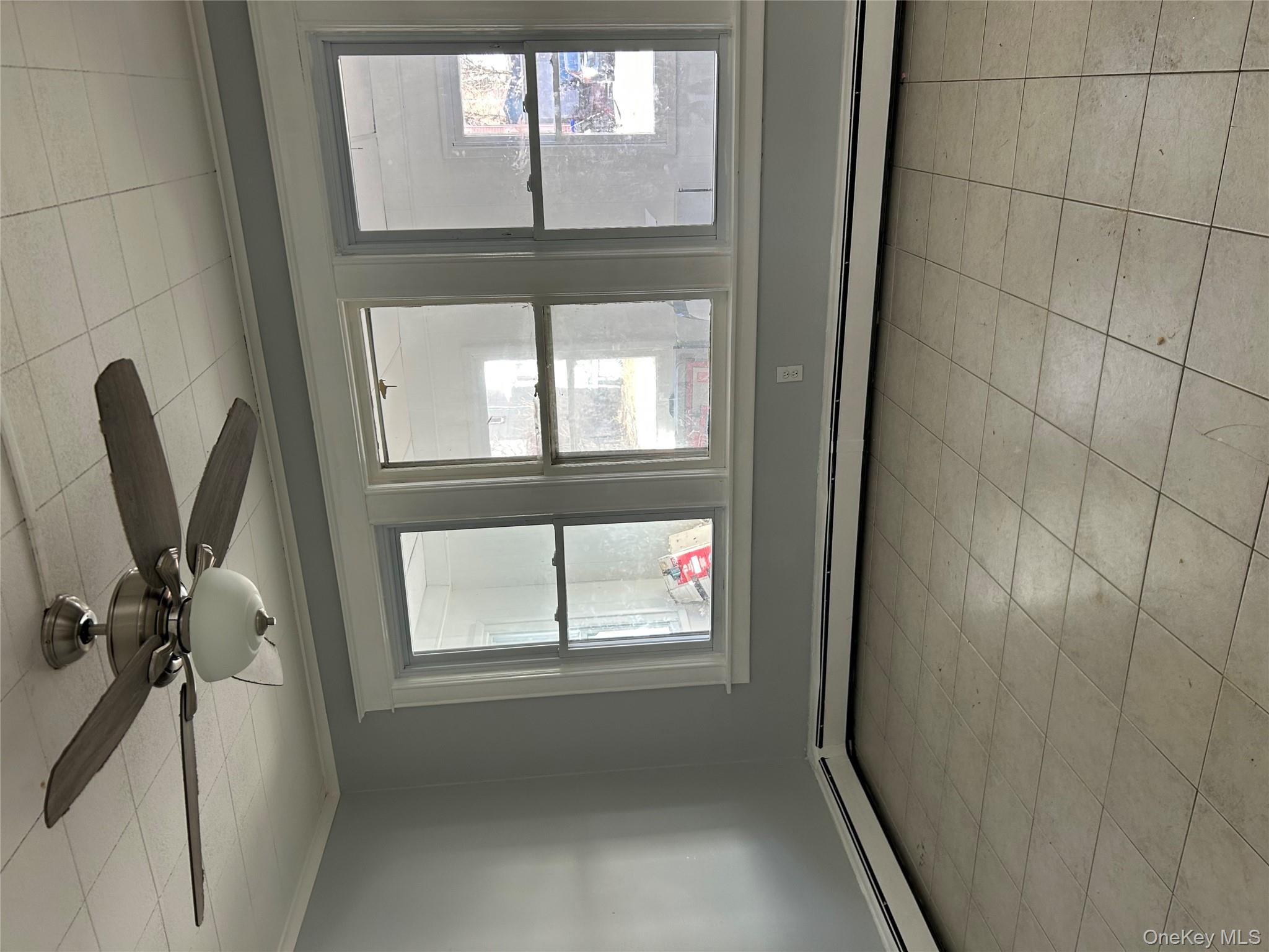 1 Gray Street Poughkeepsie, NY 12603 - Photo 7 of 22 a view of an empty room with a window