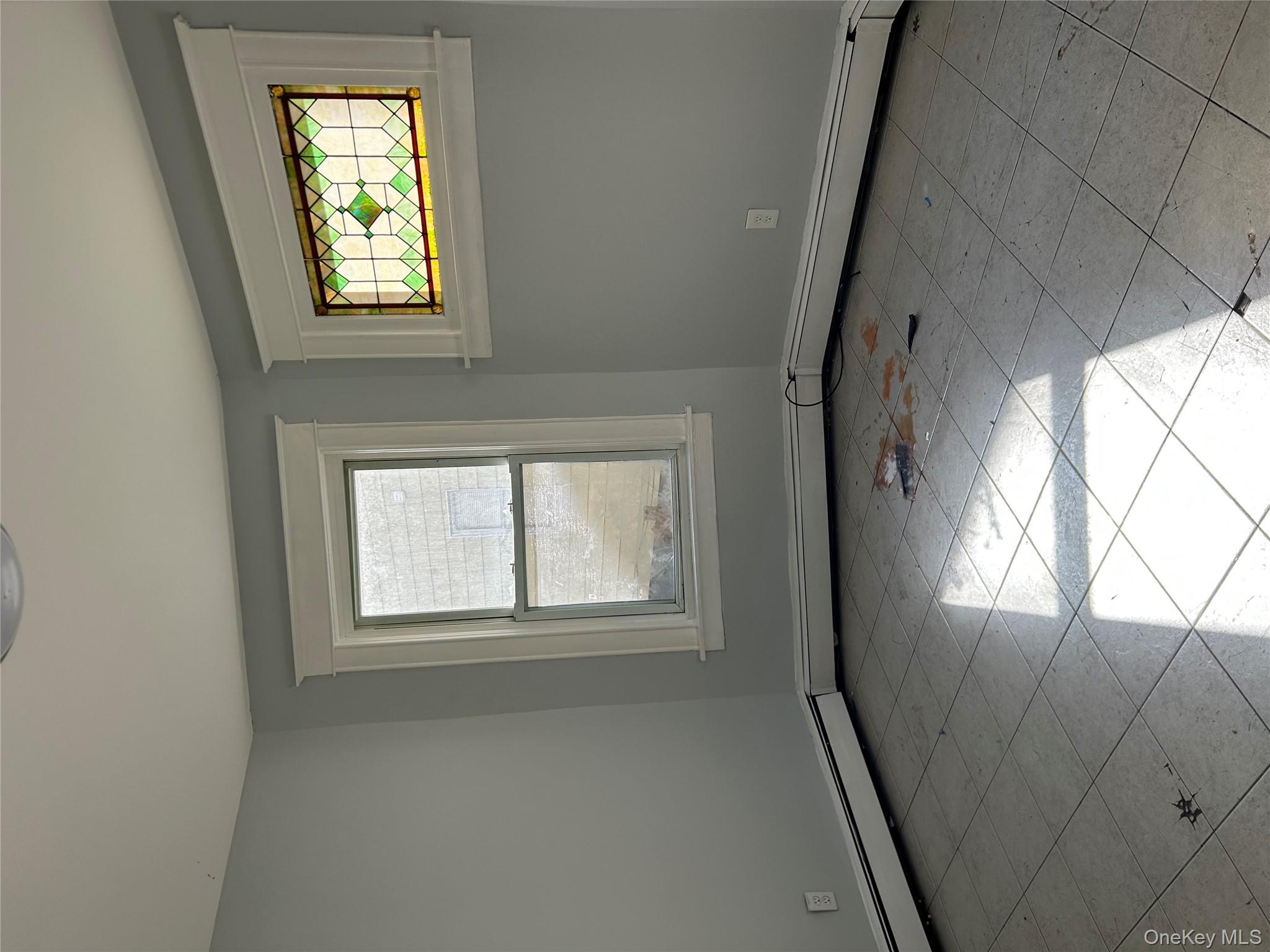 1 Gray Street Poughkeepsie, NY 12603 - Photo 8 of 22 an empty room with windows