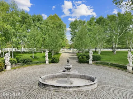 a view of a fountain in the park