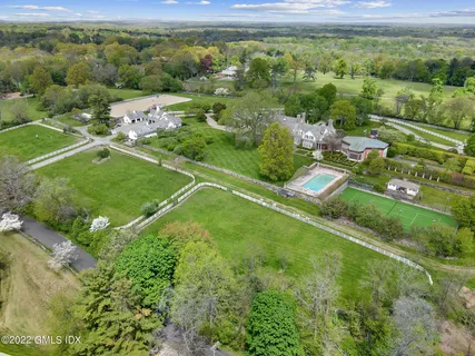 a view of a garden with a houses