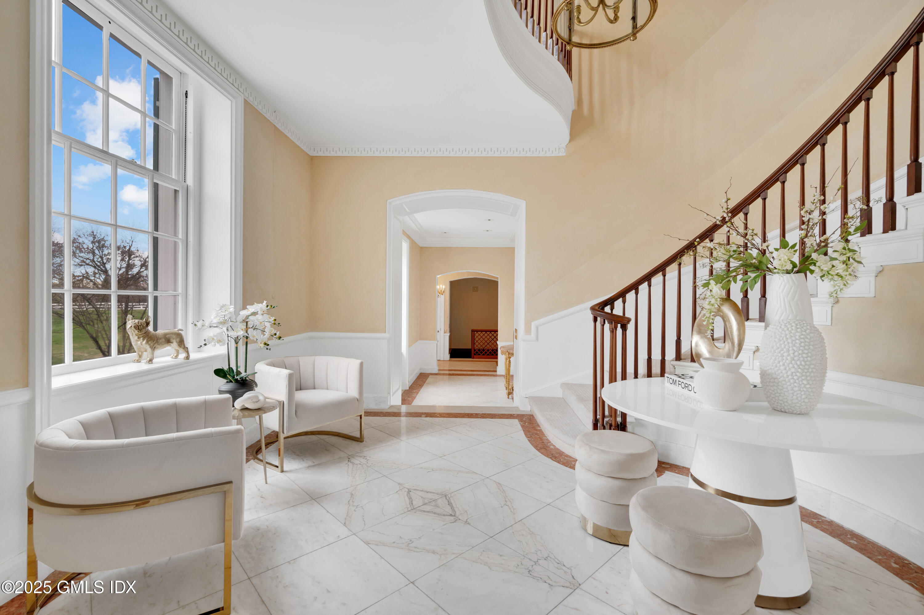 5-7 John Street Greenwich, CT 06831 - Photo 3 of 28 a living room with couches chairs and a potted plant