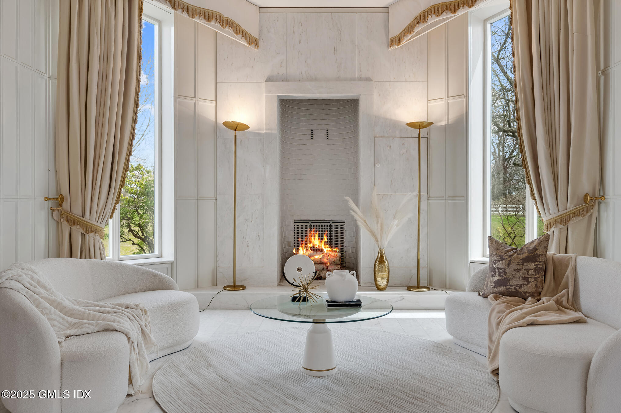 5-7 John Street Greenwich, CT 06831 - Photo 8 of 28 a living room with furniture and a large window