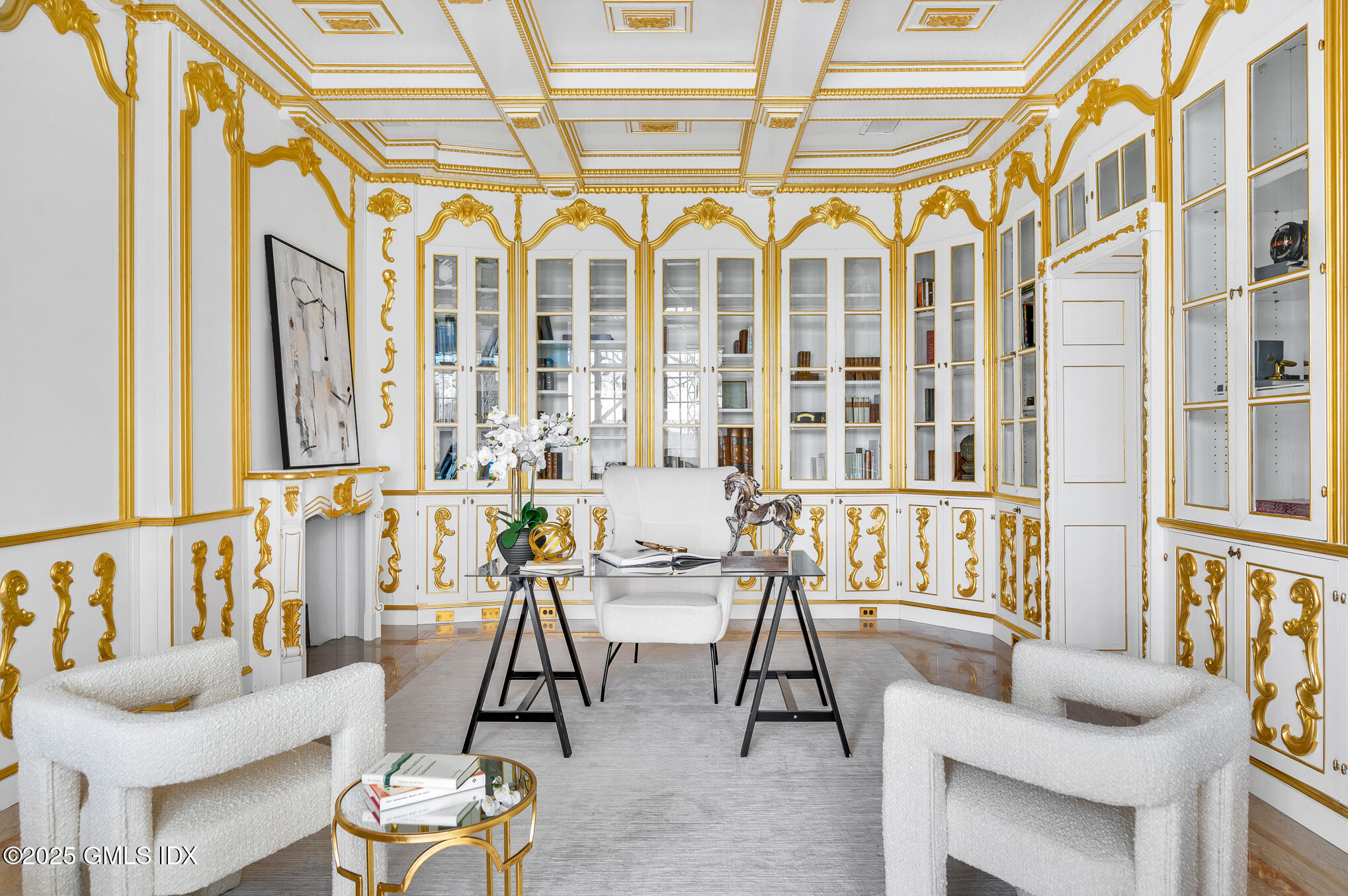 5-7 John Street Greenwich, CT 06831 - Photo 10 of 28 a living room with couches a table and chairs with wooden floor
