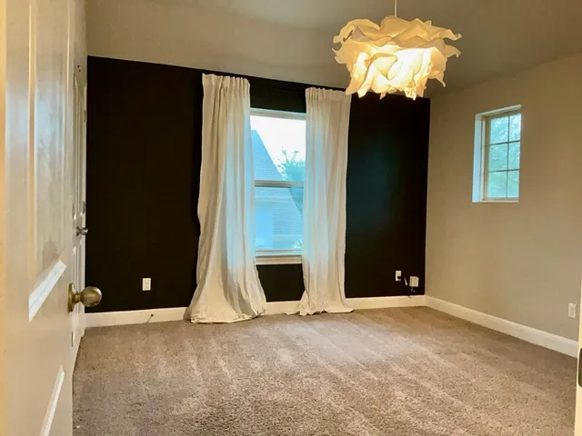 a view of a livingroom with a chandelier