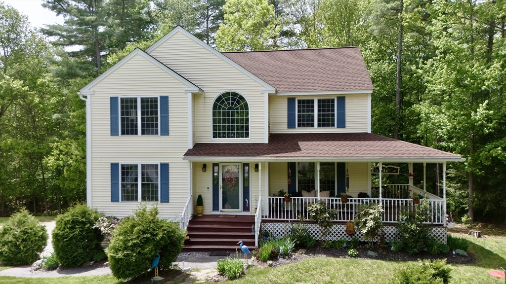 6 Loon Road Winchendon, MA 01475 - Photo 2 of 36 a front view of a house with garden and porch