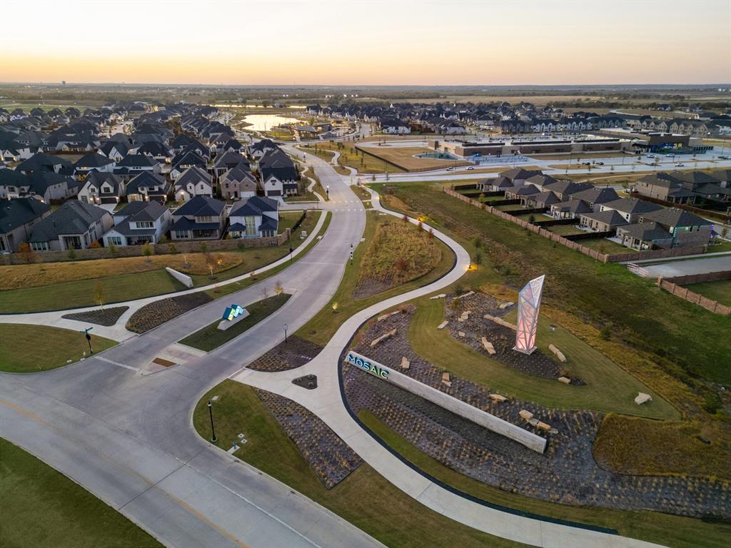 4512 Meander Way Prosper, TX 75078 - Photo 32 of 39 an aerial view of a house with a ocean view
