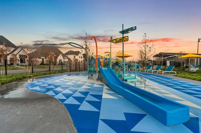 a outdoor space with lots of chairs and umbrellas