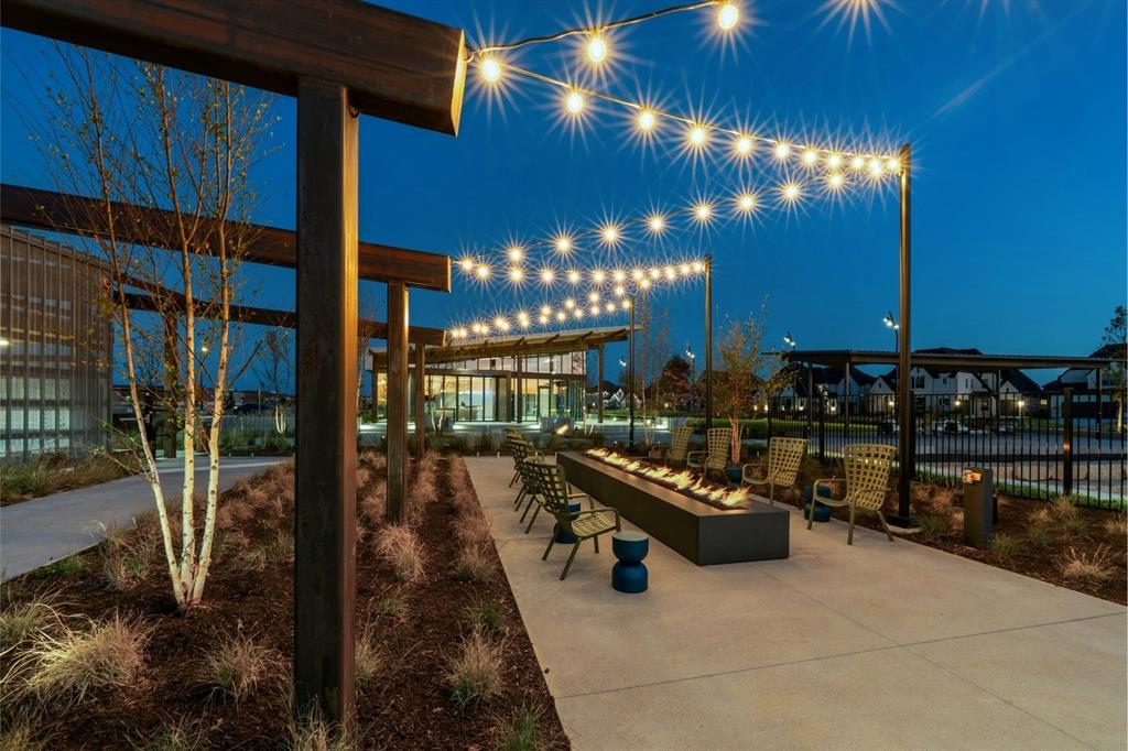 4512 Meander Way Prosper, TX 75078 - Photo 38 of 39 a outdoor space with lots of chairs and umbrellas