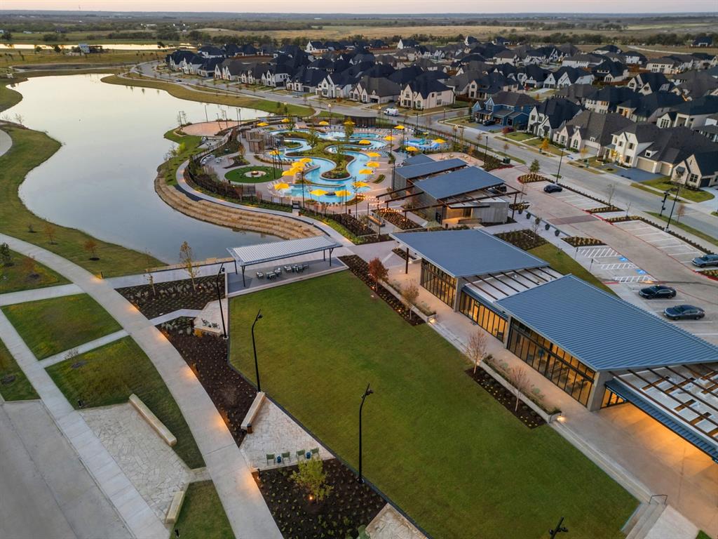 4512 Meander Way Prosper, TX 75078 - Photo 39 of 39 an aerial view of a house with a ocean view