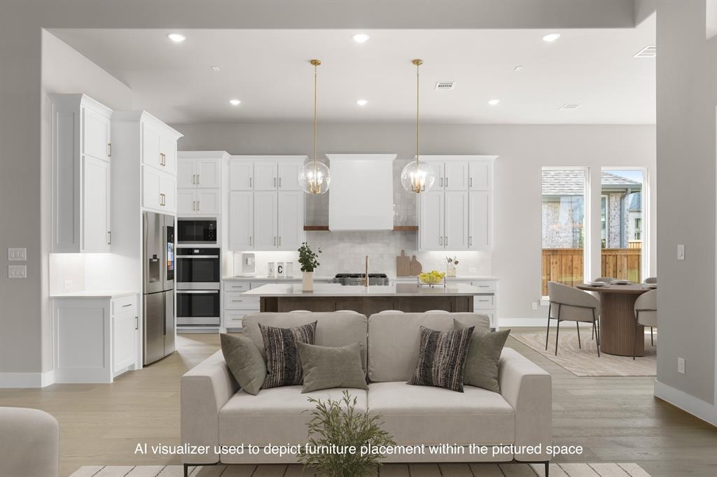 4512 Meander Way Prosper, TX 75078 - Photo 4 of 39 a living room with stainless steel appliances kitchen view and living room