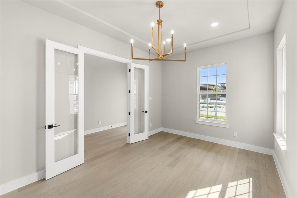 4512 Meander Way Prosper, TX 75078 - Photo 8 of 39 a view of an empty room with a window