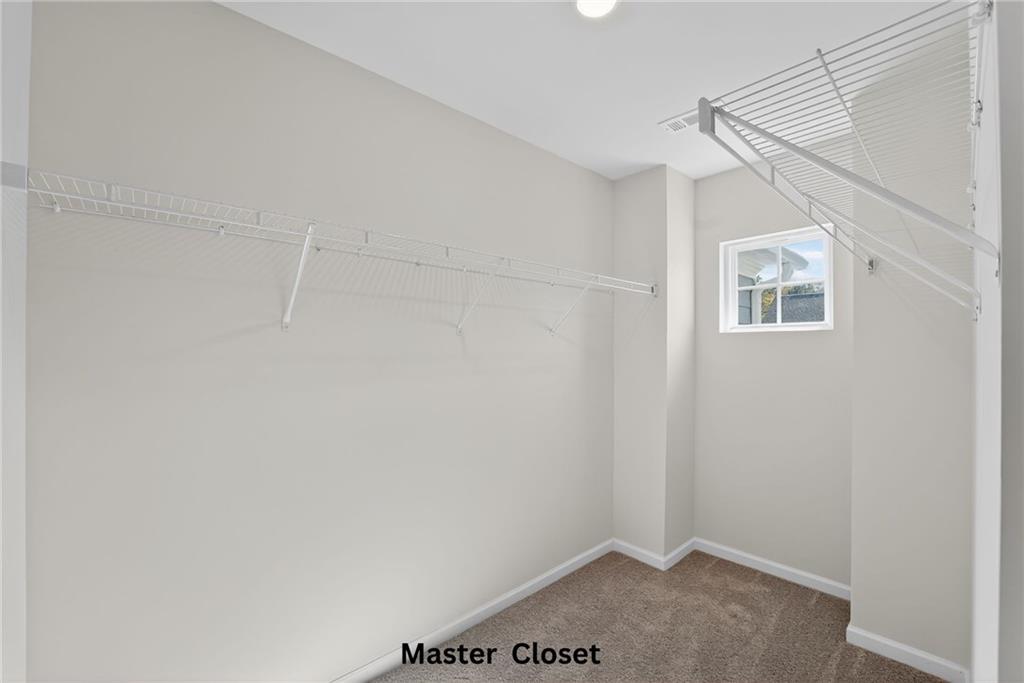 233 Bloomfield Circle Canton, GA 30114 - Photo 12 of 22 a view of a small space with wooden floor and a window