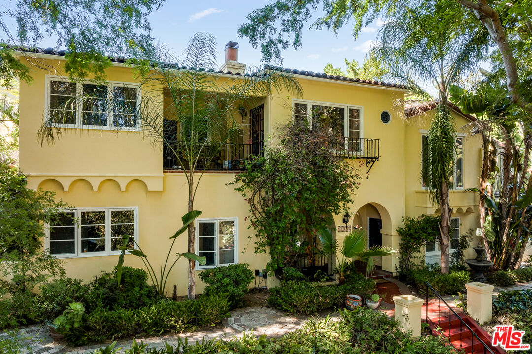 1437 East Mountain Street Glendale, CA 91207 - Photo 1 of 30 a view of a building with a garden