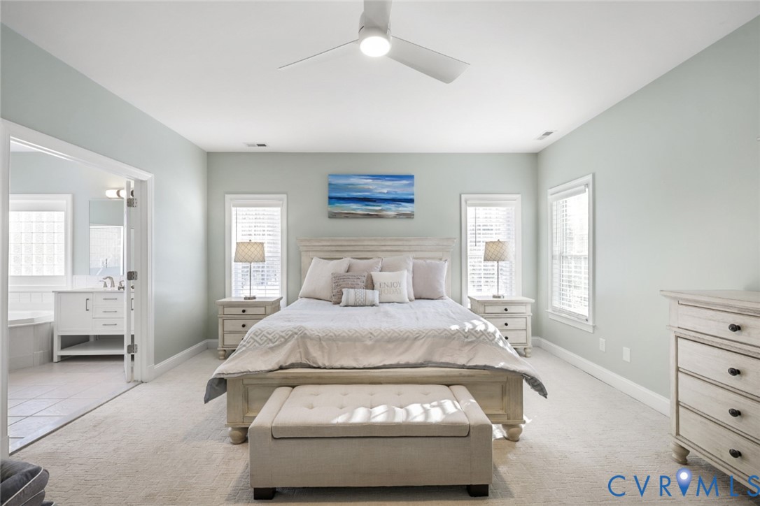 8901 First Branch Lane Chesterfield, VA 23838 - Photo 13 of 38 The first-floor primary suite is spacious and incl