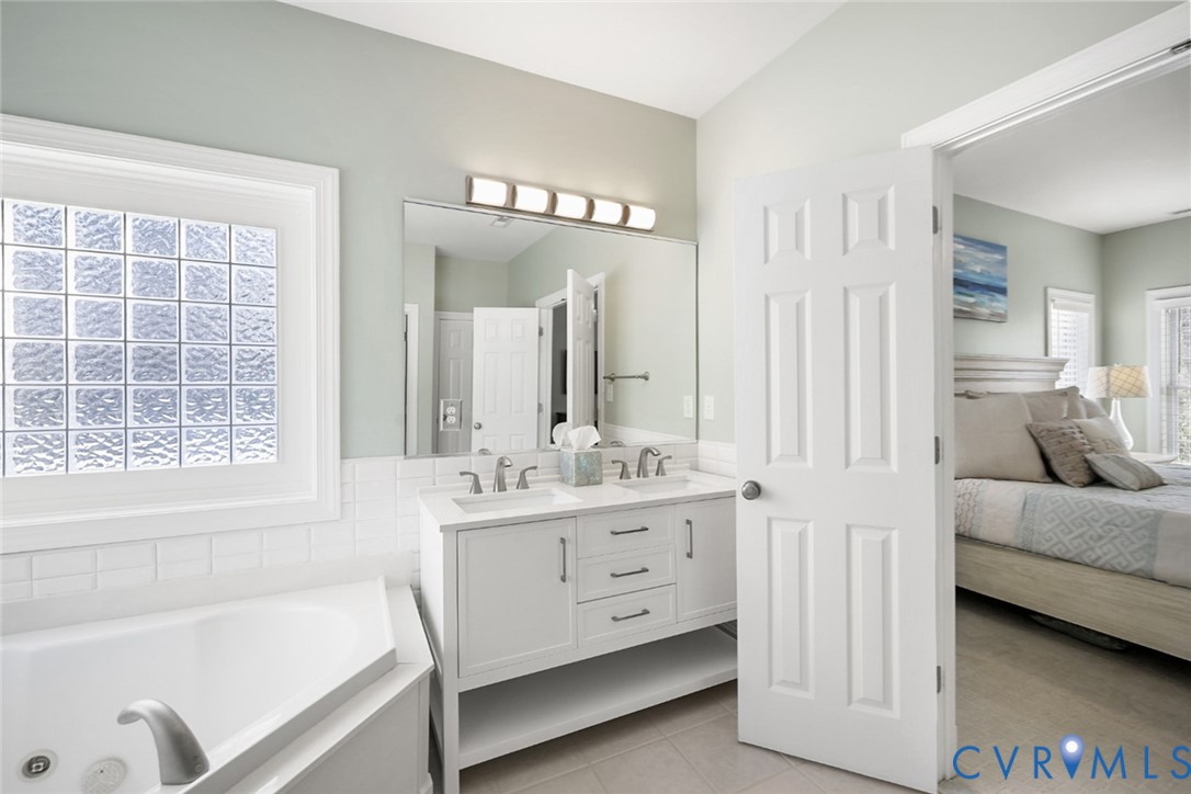 8901 First Branch Lane Chesterfield, VA 23838 - Photo 15 of 38 The first-floor primary suite is spacious and incl