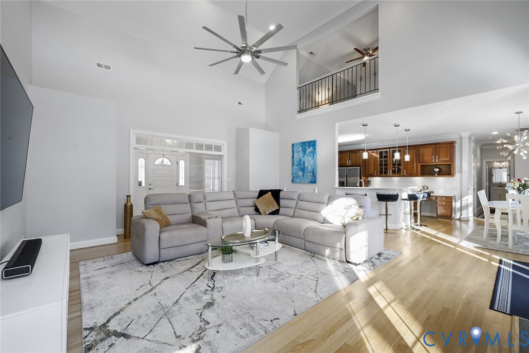 8901 First Branch Lane Chesterfield, VA 23838 - Photo 3 of 38 The two-story family room is filled with natural l