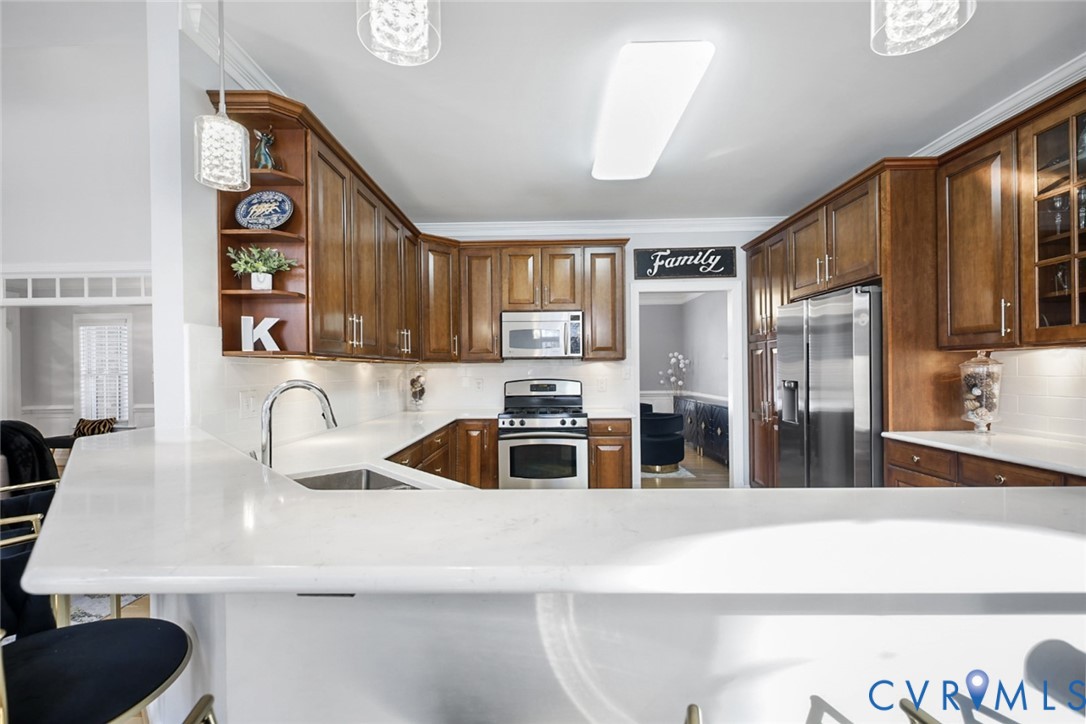 8901 First Branch Lane Chesterfield, VA 23838 - Photo 8 of 38 The light and bright kitchen opens seamlessly to t