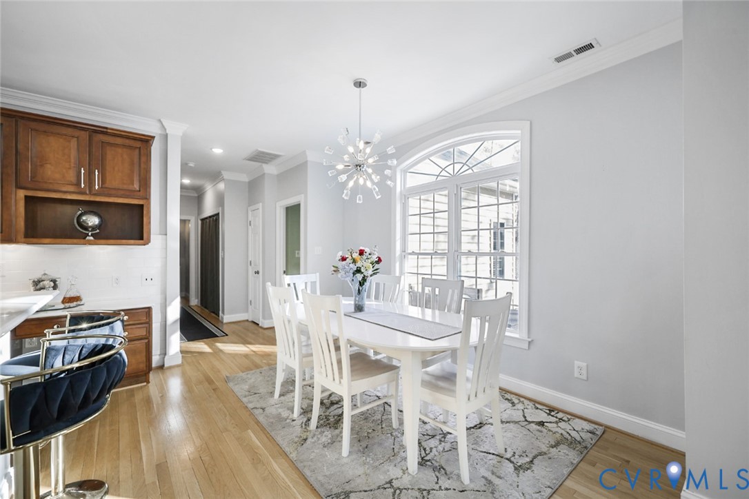 8901 First Branch Lane Chesterfield, VA 23838 - Photo 9 of 38 The light and bright kitchen opens seamlessly to t
