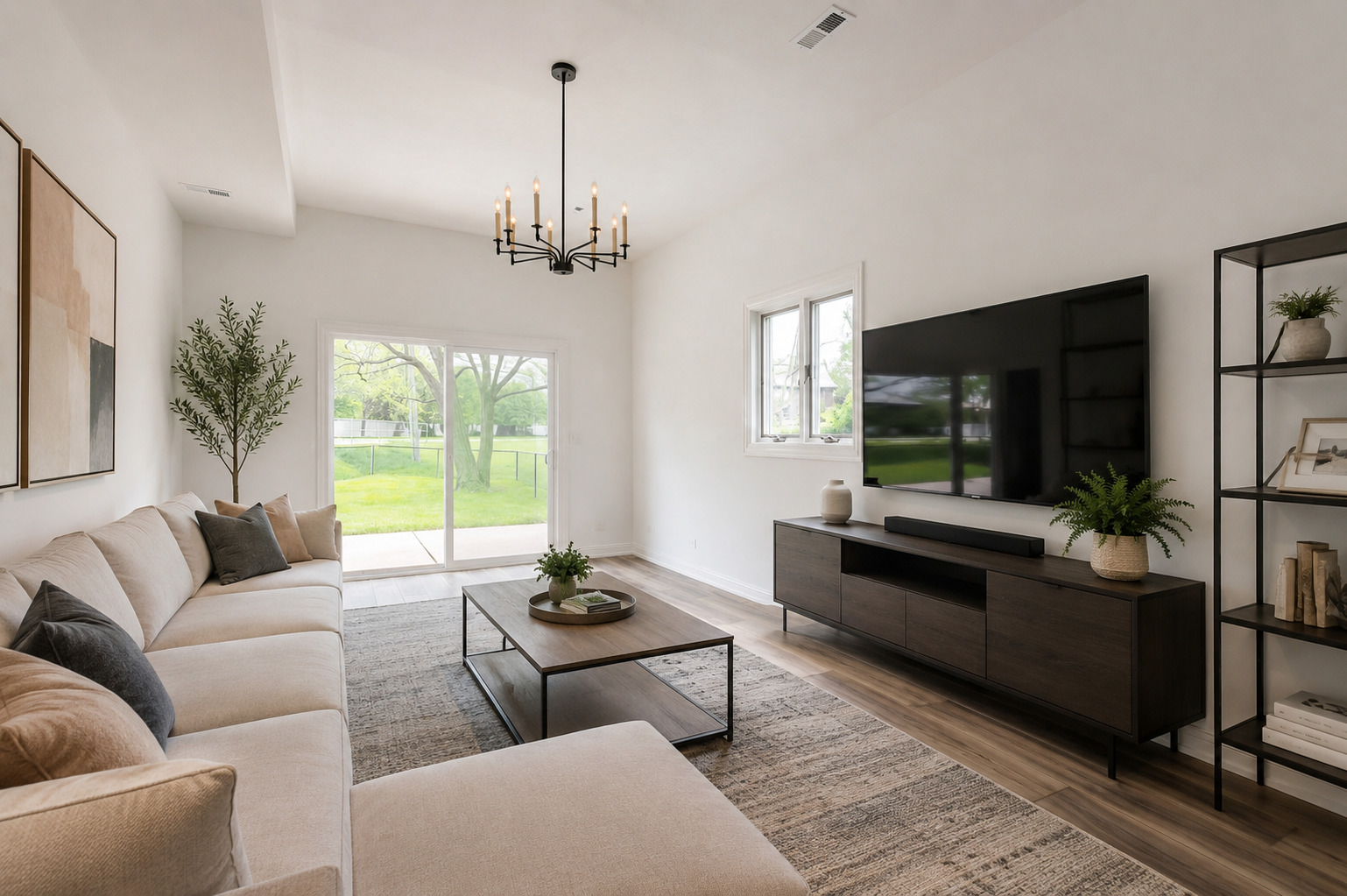 1170 McCarthy Road Lemont, IL 60439 - Photo 38 of 53 a living room with furniture a flat screen tv and a large window