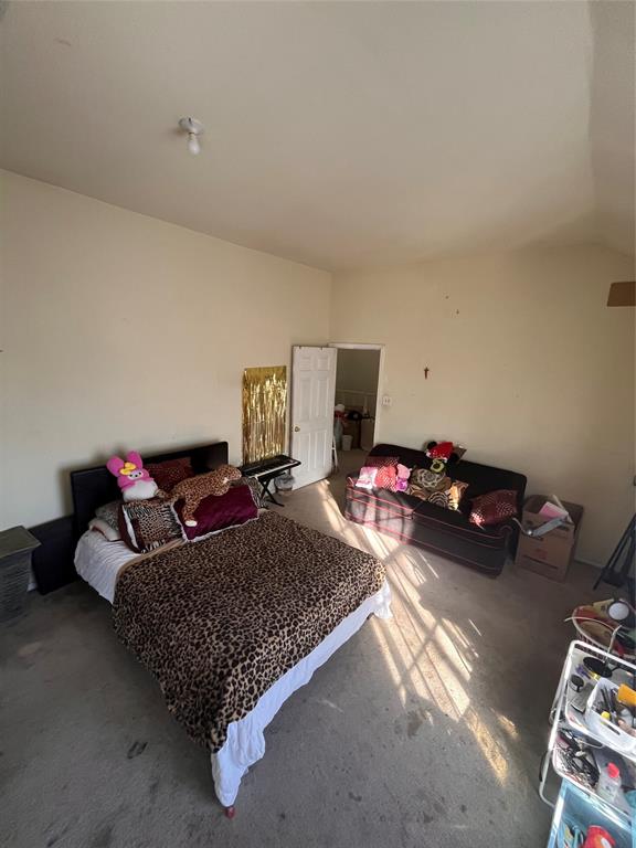 4838 Wisteria Street Dallas, TX 75211 - Photo 16 of 19 a living room with furniture and a couch