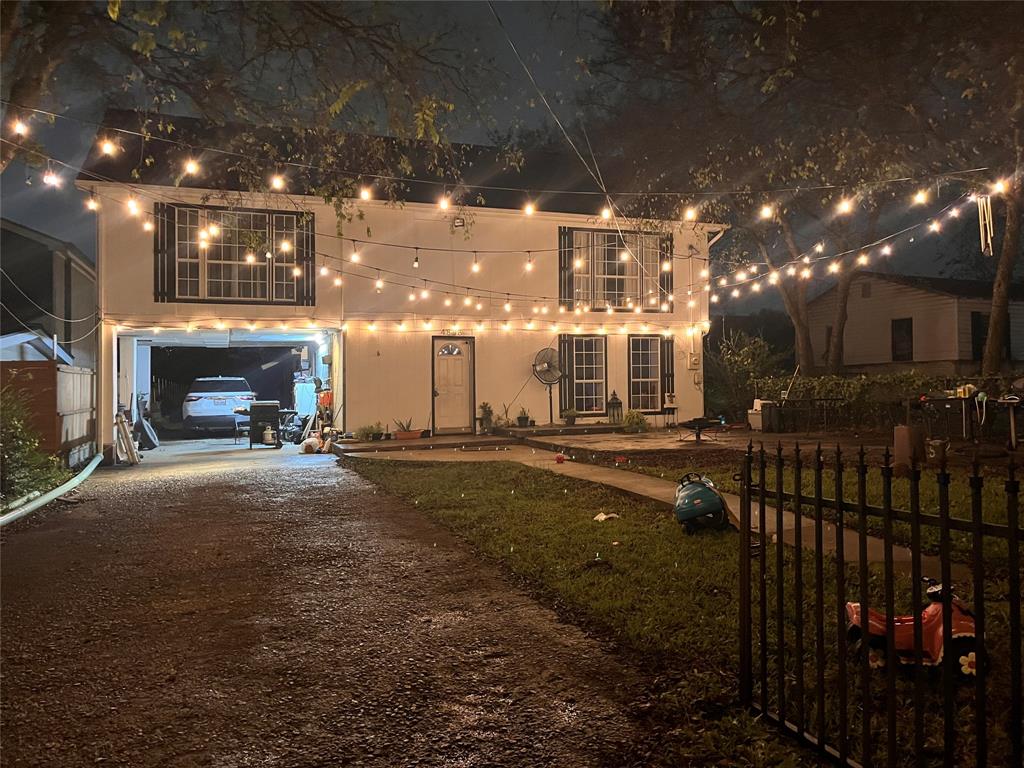 4838 Wisteria Street Dallas, TX 75211 - Photo 3 of 19 a view of a house with a patio