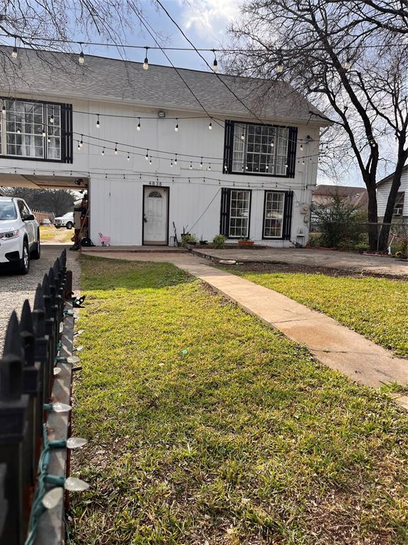 4838 Wisteria Street Dallas, TX 75211 - Photo 6 of 19 a swimming pool view with a outdoor seating space