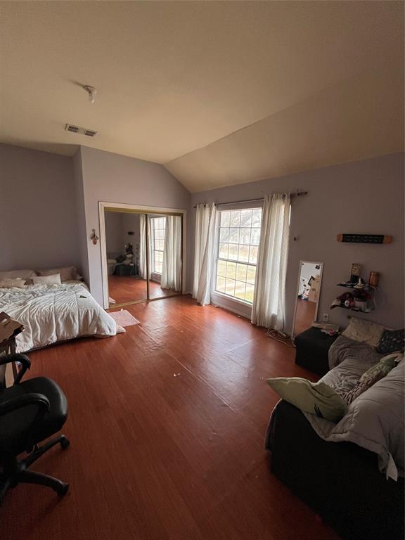 4838 Wisteria Street Dallas, TX 75211 - Photo 7 of 19 a living room with furniture window and a lamp