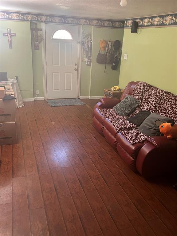 4838 Wisteria Street Dallas, TX 75211 - Photo 10 of 19 a bedroom with a bed and a walk in closet