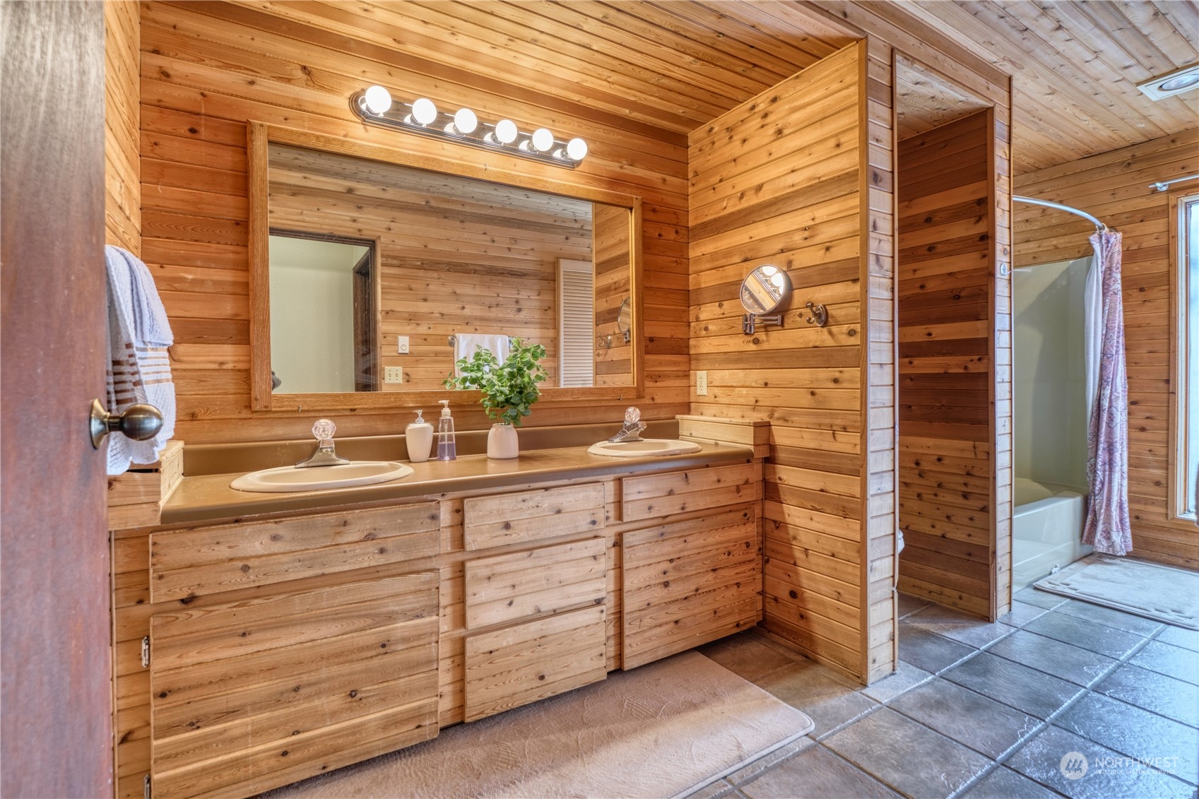 1856 Cliff Road Point Roberts, WA 98281 - Photo 24 of 37 a bathroom with a double vanity sink and a mirror