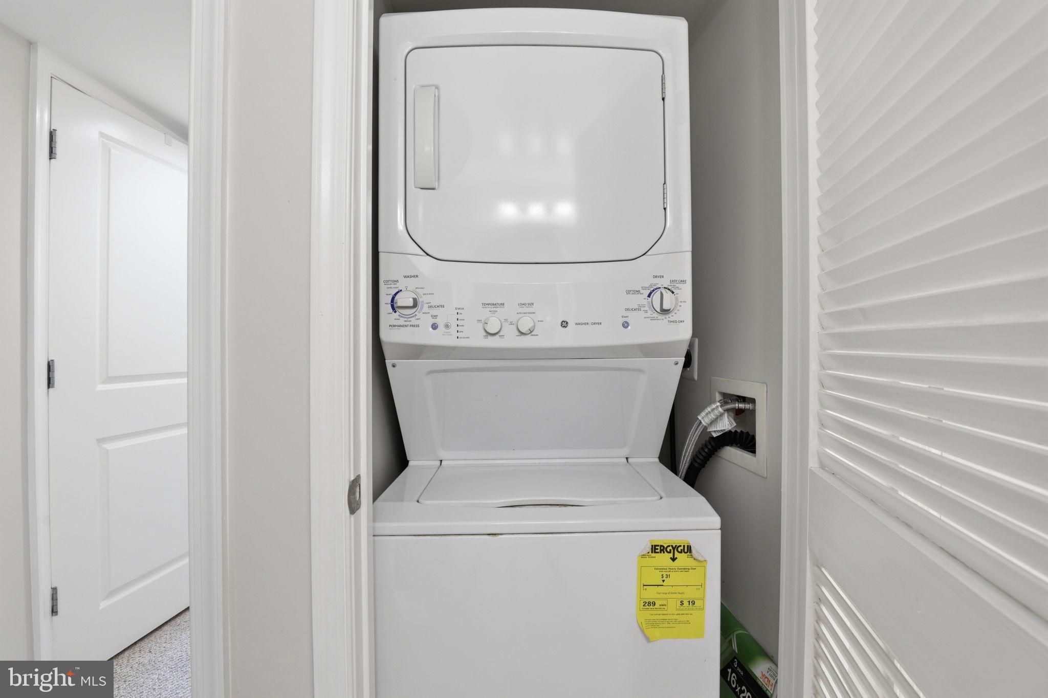 11800 Sunset Hills Road, Unit 218 Reston, VA 20190 - Photo 30 of 38 a utility room with dryer and washer