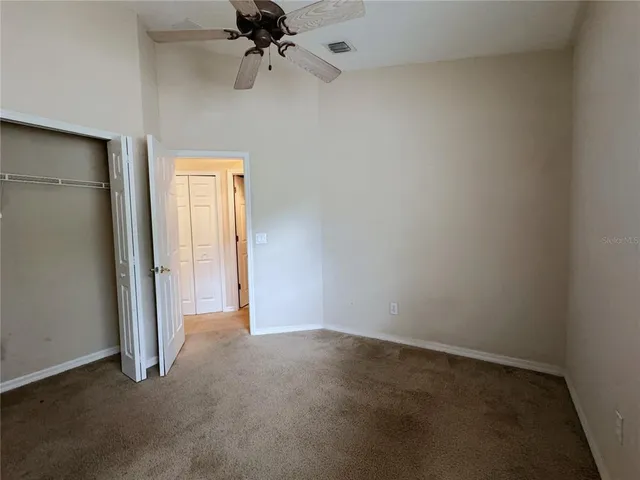 an empty room with a empty space and a window