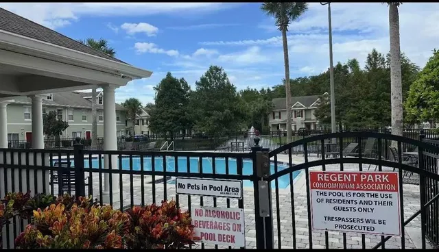 a view of chairs and table in patio