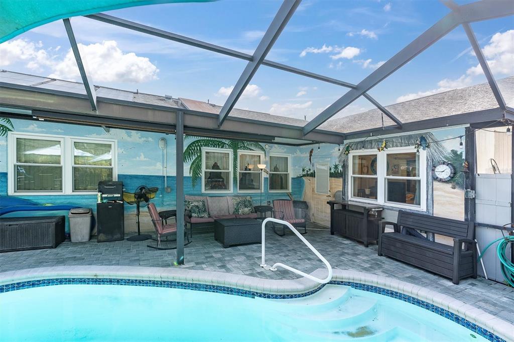 18809 Parade Road Hudson, FL 34667 - Photo 31 of 37 a indoor swimming pool with outdoor seating