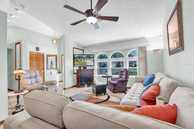 a living room with furniture and a table