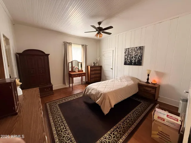 a bed room with a bed and furniture