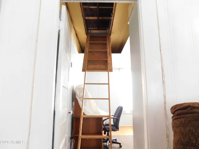 a view of a living room with furniture