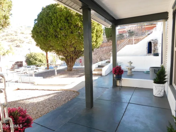 a view of a backyard of the house