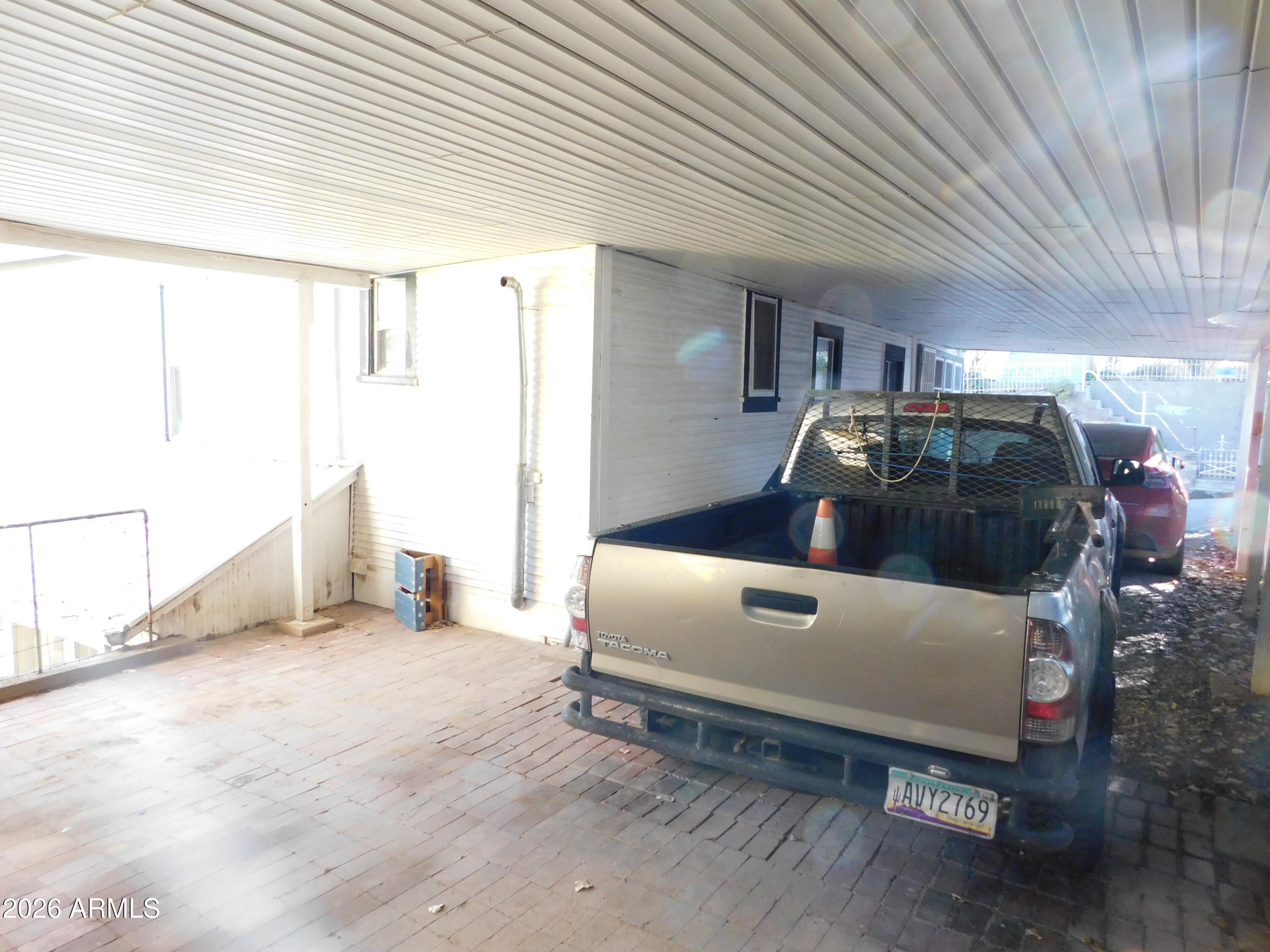 414 Tombstone Canyon Bisbee, AZ 85603 - Photo 39 of 44 a room with a bed and a window