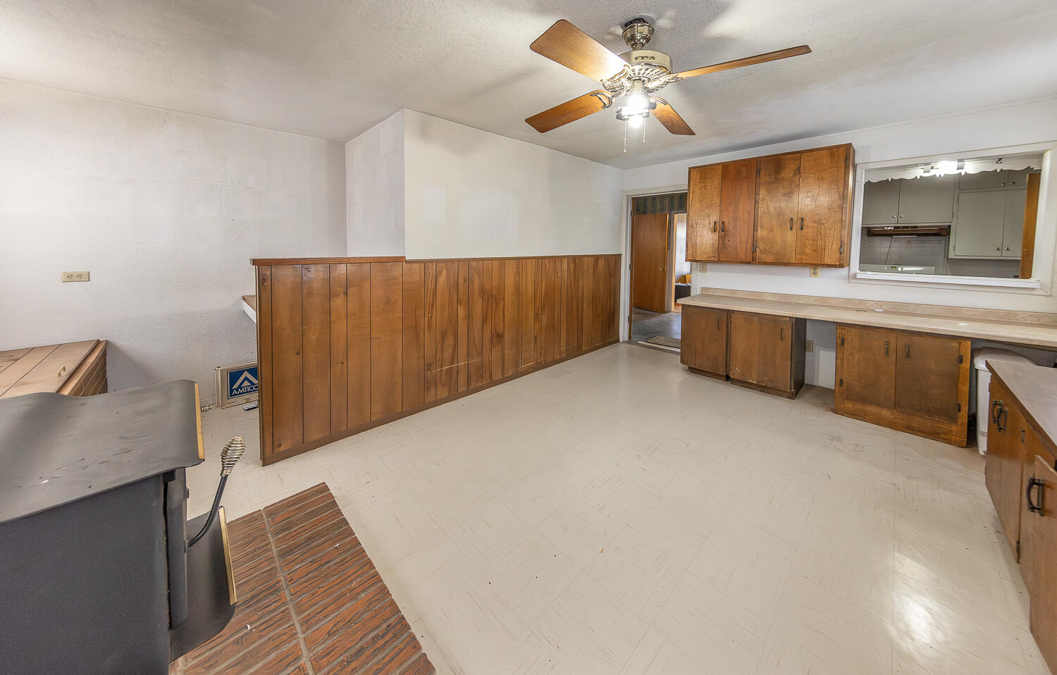 1918 42nd Street Lubbock, TX 79412 - Photo 11 of 29 a view of a kitchen with a sink and cabinets