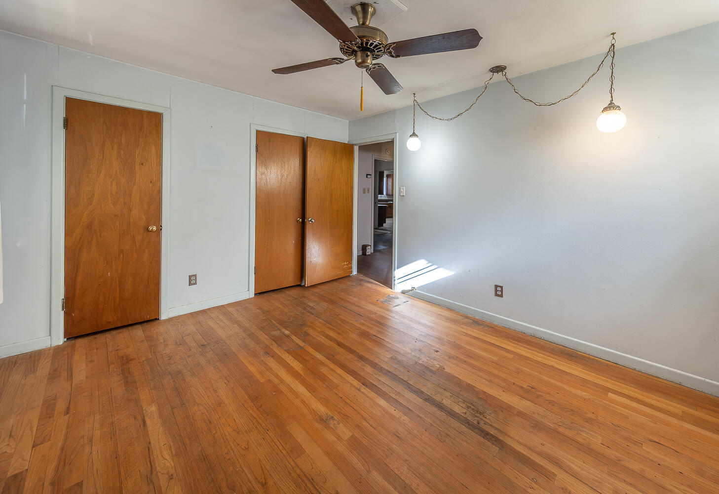 1918 42nd Street Lubbock, TX 79412 - Photo 13 of 29 a view of an empty room and wooden floor